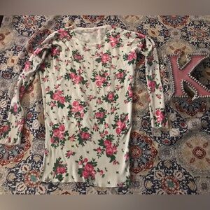 Cozy up in this floral fave - the country rose sweater! Sweet and sassy! 💁‍♀️